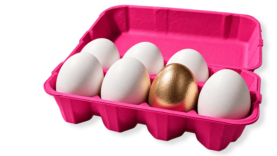 Pink carton of white eggs with one gold egg